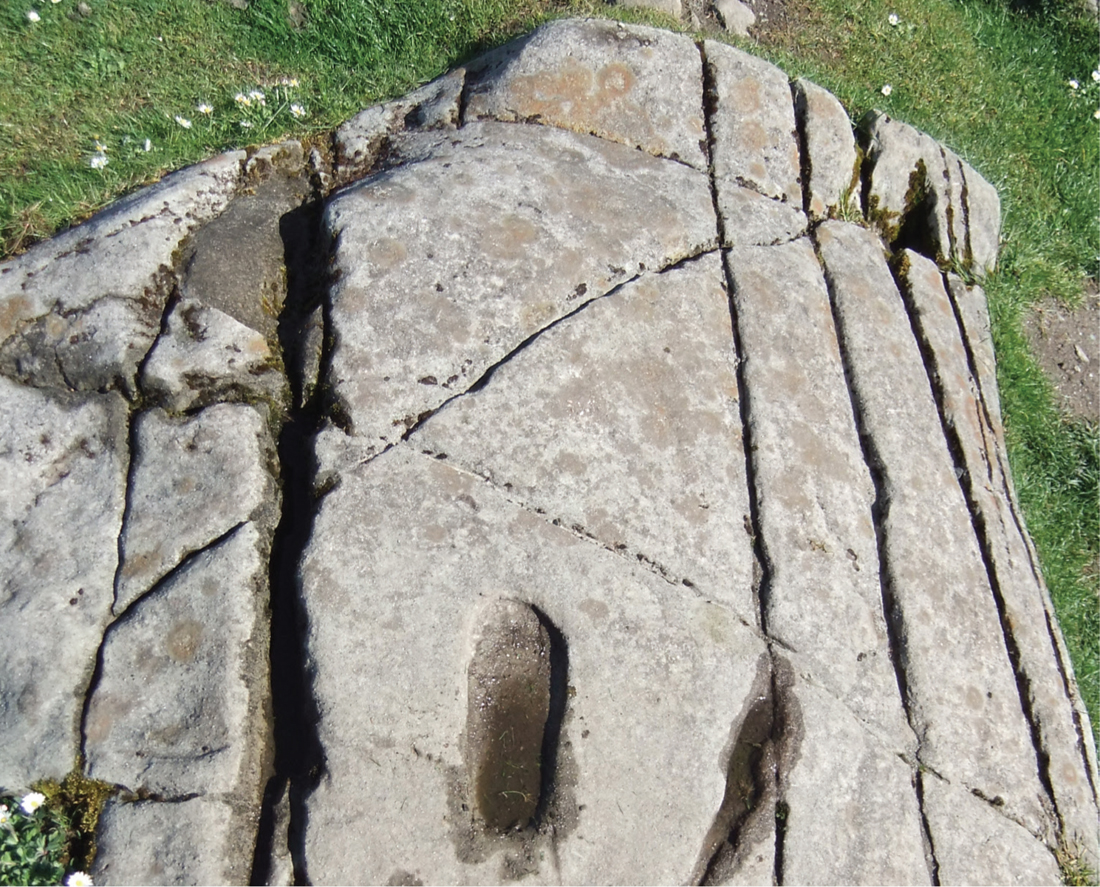 14 A stone footprint at the Dl Riatan stronghold of Dunadd Argyll which may - photo 15