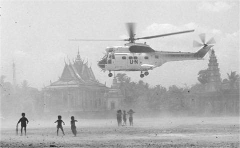 13 Cambodia collides with the new world order a UN helicopter takes off near a - photo 15