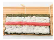 Place one half-sheet of nori horizontally on a sushi mat Without crushing the - photo 7