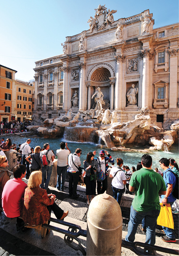 Neptune presides over the baroque Trevi Fountain where tossing in a coin is - photo 12