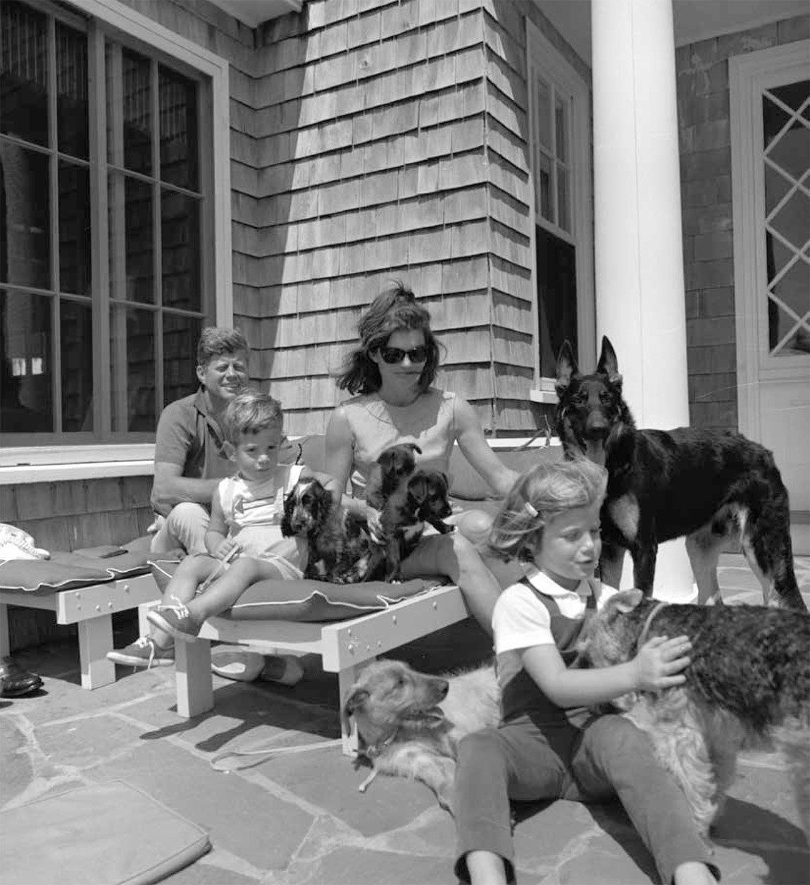 The Kennedy family on Cape Cod in 1963 with eight of the nine dogs they - photo 2