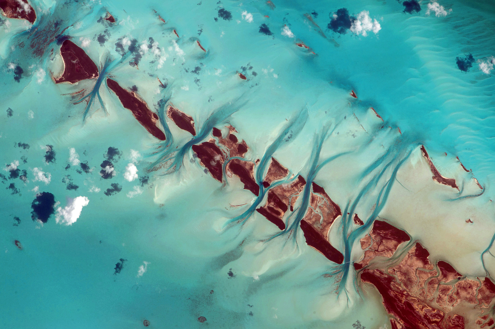 The Exuma islands in the Bahamas look like the spine of a dinosaur lying in the - photo 2