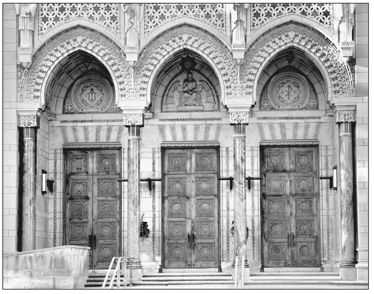 The three arched porticos surround three sets of bronze double doors which - photo 5