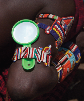 Beaded bracelets and sometimes hand mirrors are an important adornment for the - photo 6