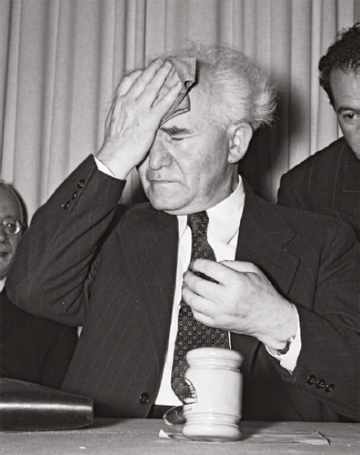 David Ben-Gurion just moments before declaring the new state on May 14 1948 - photo 19