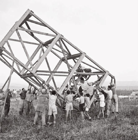 Men constructing a tower and stockade homa u-migdal settlement Central - photo 5