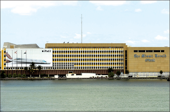 Miami Herald building with Herald logo on right and Apple iPad billboard on - photo 4