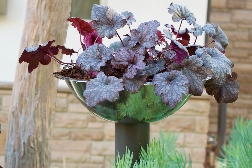 A flying saucer planter made from industrial salad bowls and PVC piping - photo 2