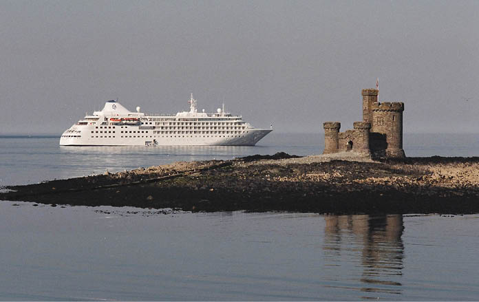 A small luxury ship approaches Douglas Bay on the Isle of Man The array of - photo 11