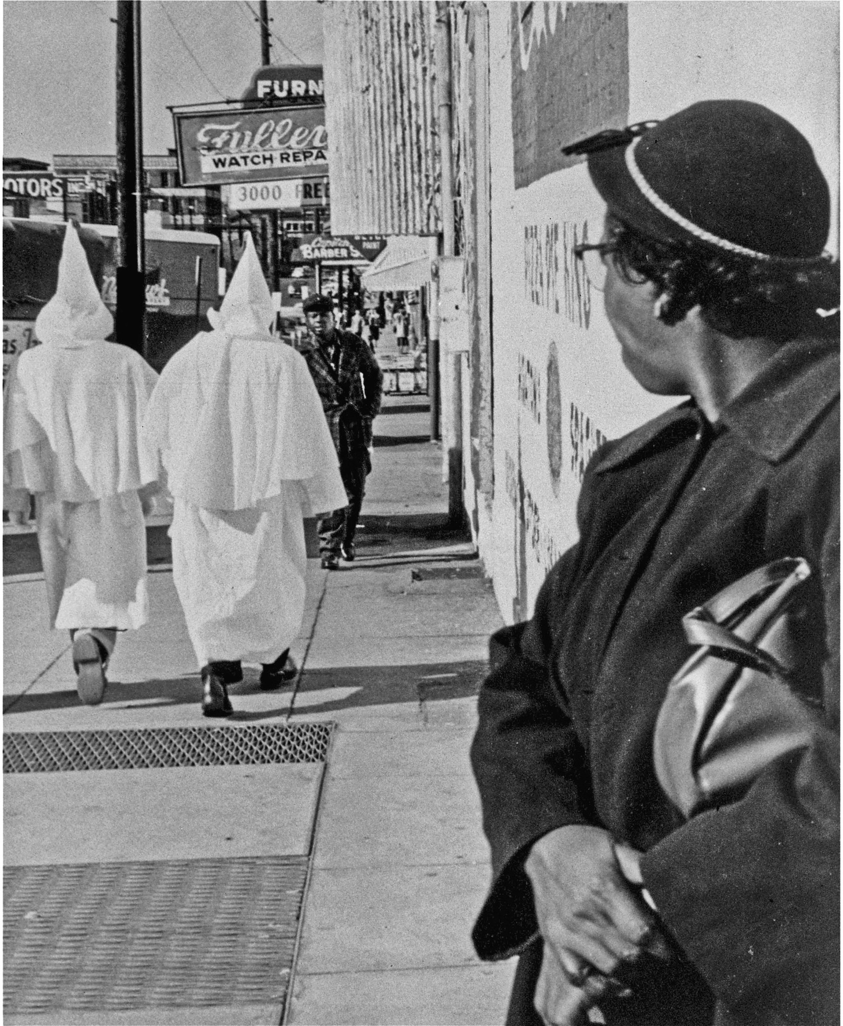 Ku Klux Klansmen on a stroll through downtown Montgomery Alabama in November - photo 4