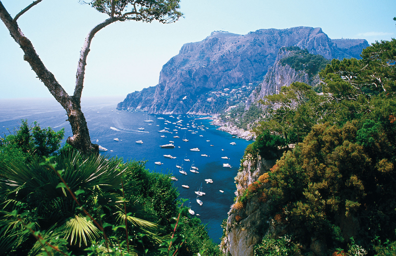 Rugged mountains meet the jewel-like sea on the southern coast of Capri - photo 4