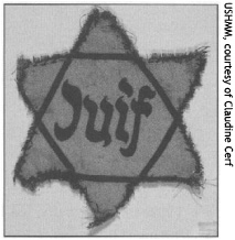 A star of David with the French word for Jew Juif printed on it As the war - photo 3