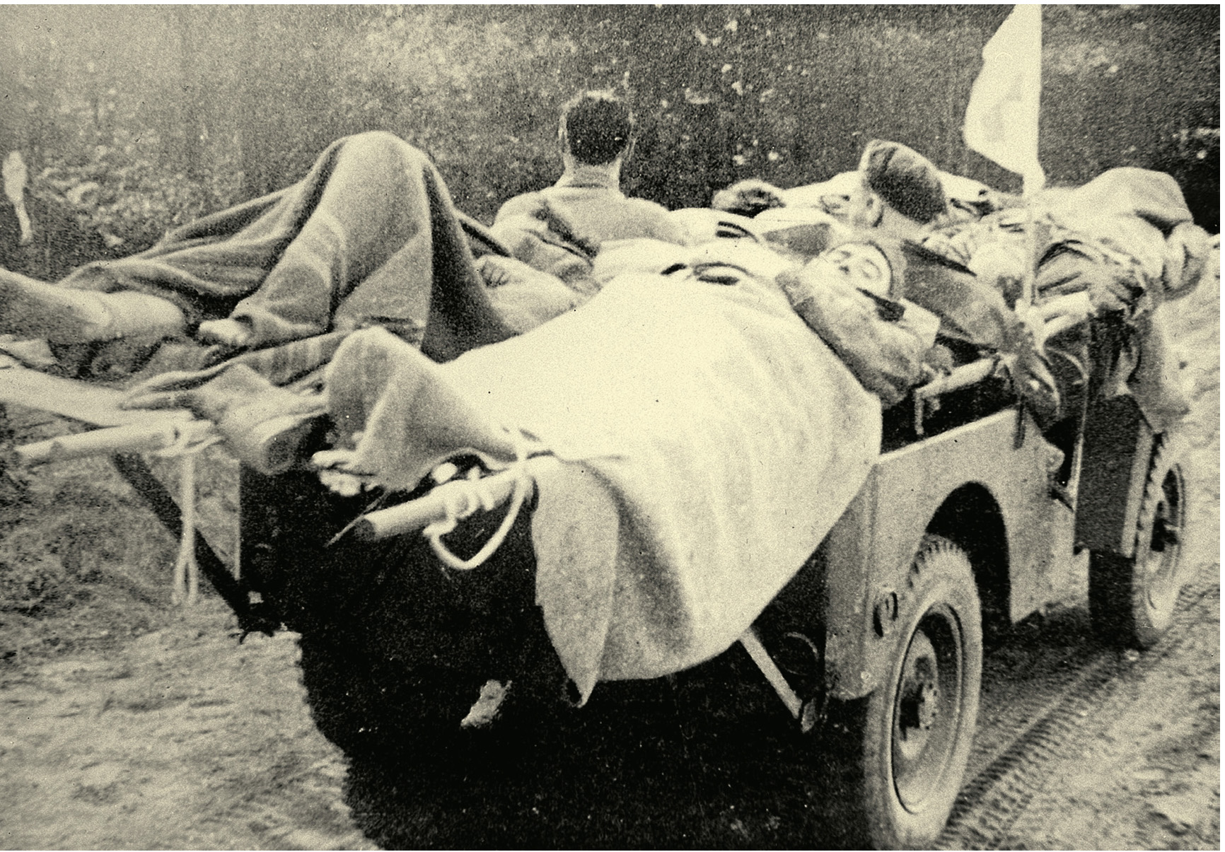 Wounded soldiers evacuated by jeep France 1944 A page from the ancient - photo 4