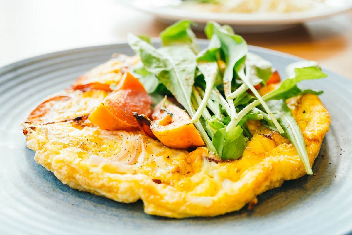 Delicious crispy bacon with creamy avocado takes this omelet to another level - photo 8