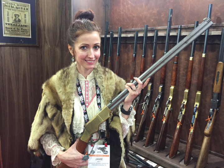 Jamie Wayt of Cimarron Firearms with a replica Model 1860 Henry at the SHOT - photo 8