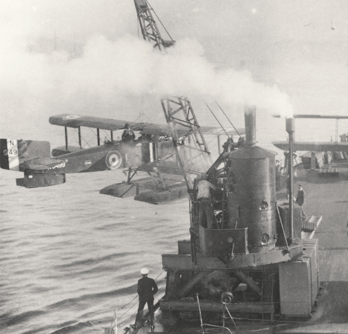 A Fairy IIIF of 267 Squadron is hoisted aboard the seaplane carrier HMS Ark - photo 6