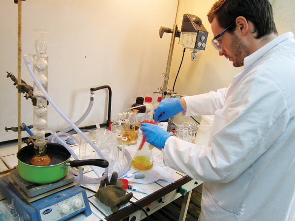 A chemical companys researcher conducts experiments to recover traces of - photo 5