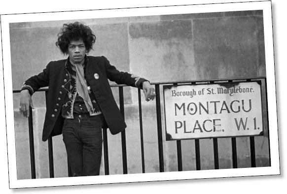 JIMI POSES NEAR THE FIRST LONDON FLAT HE SHARED WITH MANAGER CHAS CHANDLER - photo 4