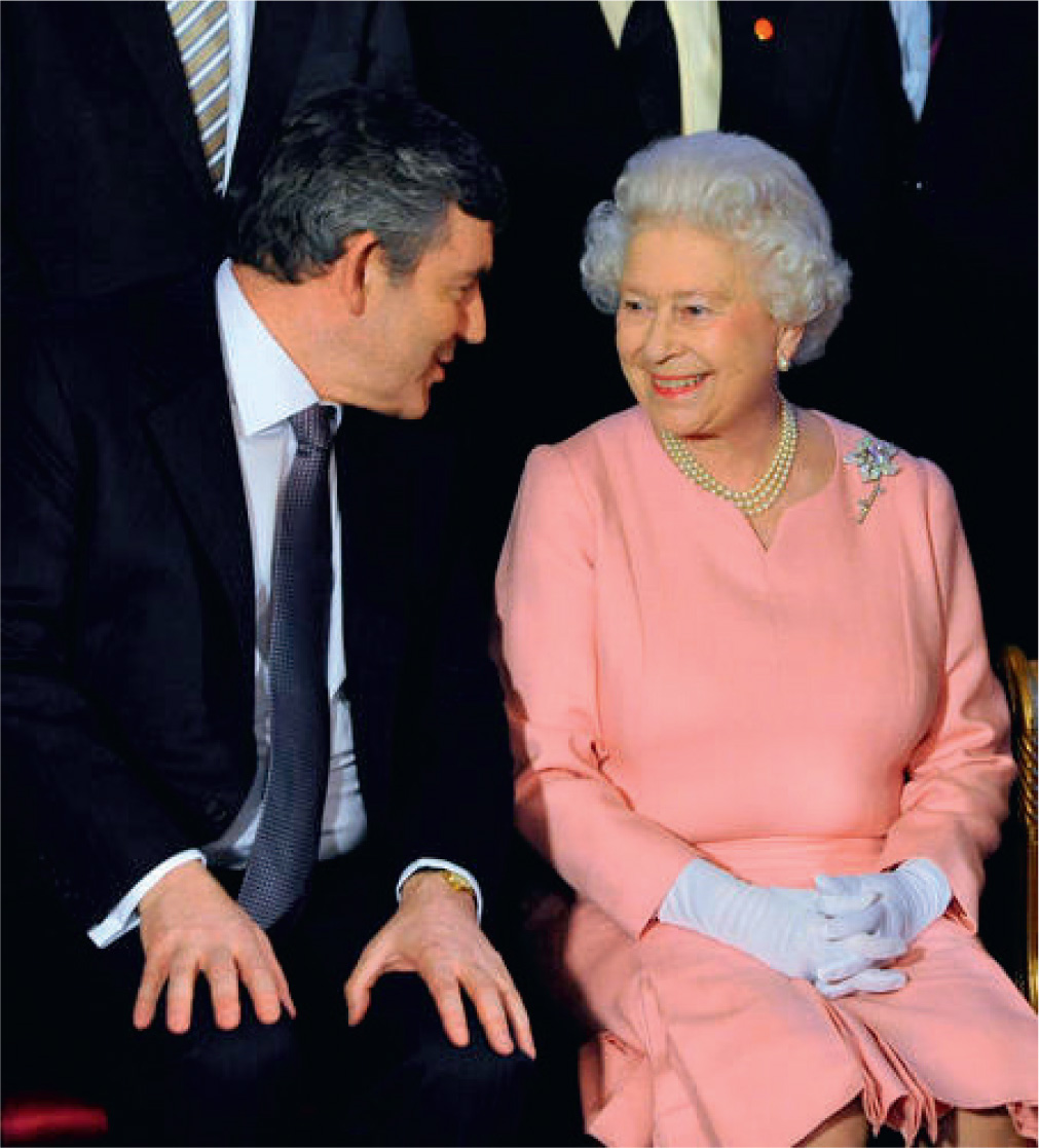 A photograph with HM Queen Elizabeth II taken at Buckingham Palace at the - photo 27