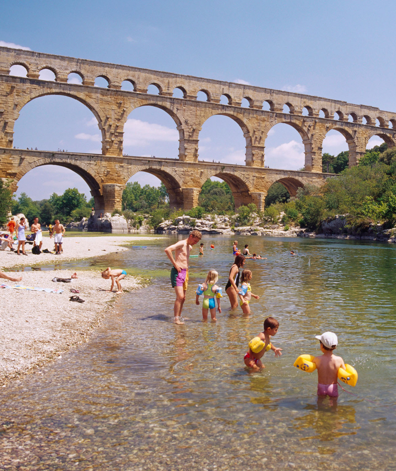 Paddling in the river below the Pont du Gard Best cities While Paris steals - photo 9