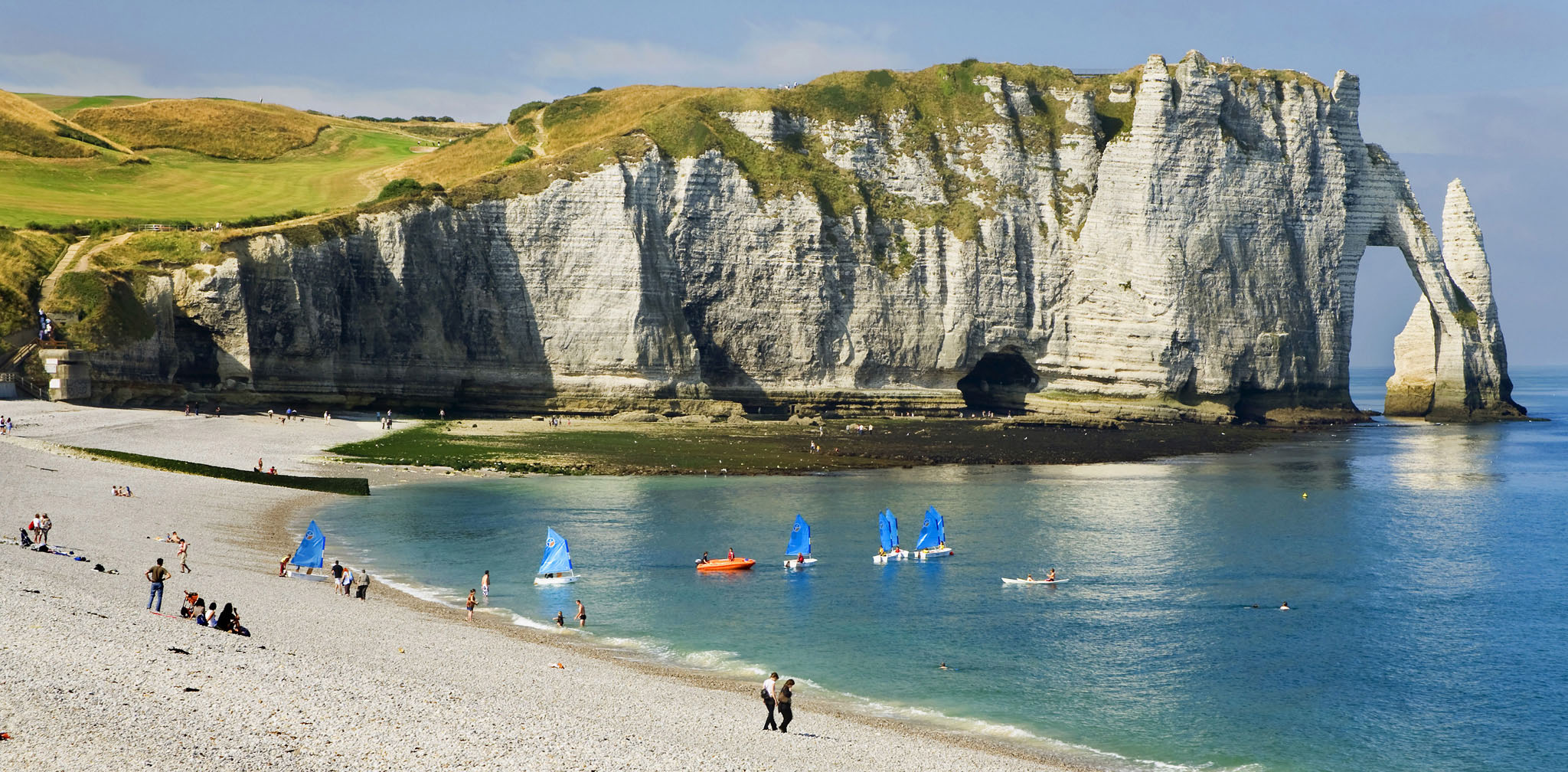 The natural arch at the pebble beach in tretat Normandy lt France through - photo 11