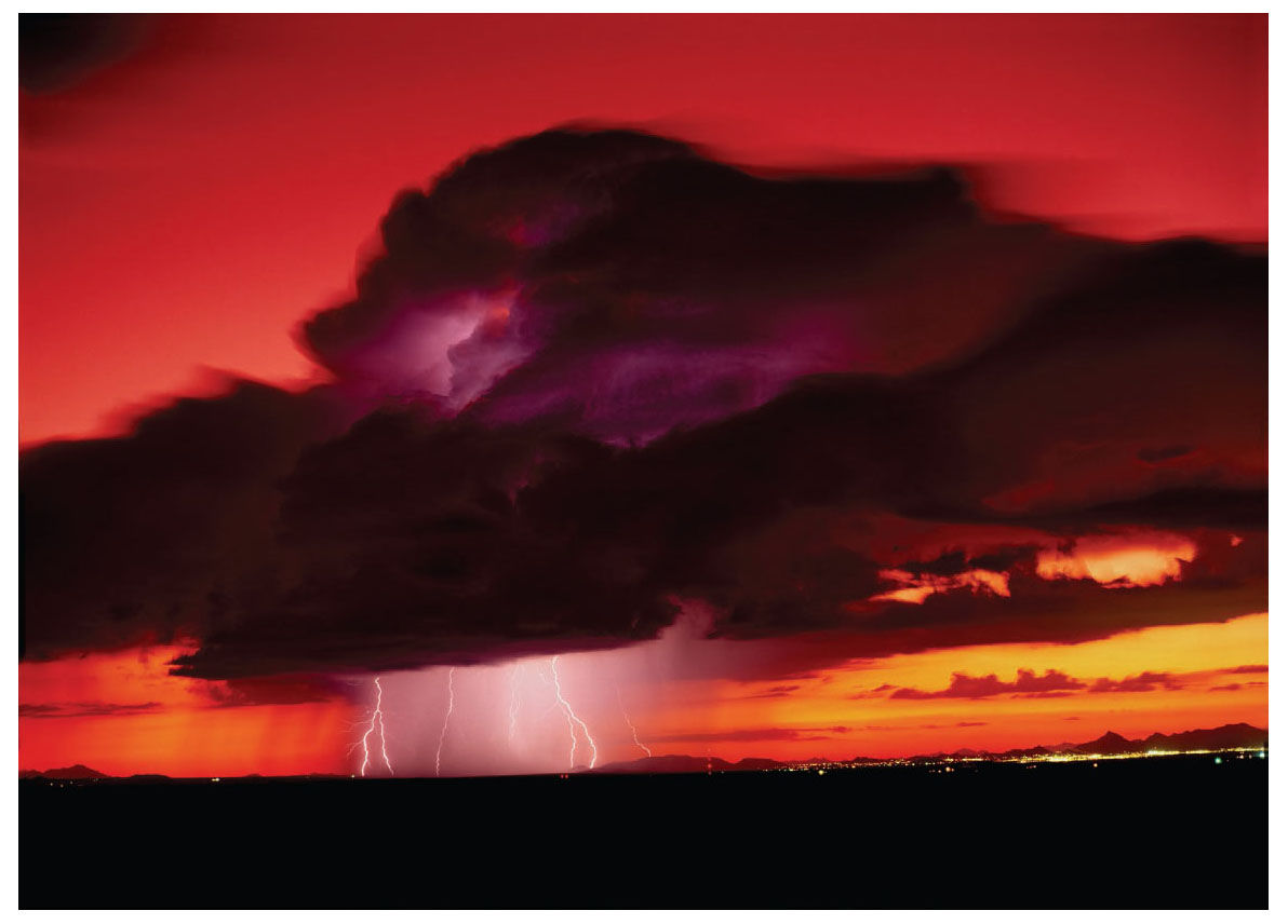 The blood-red backdrop for this thunderhead in Tucson was provided in part by a - photo 12