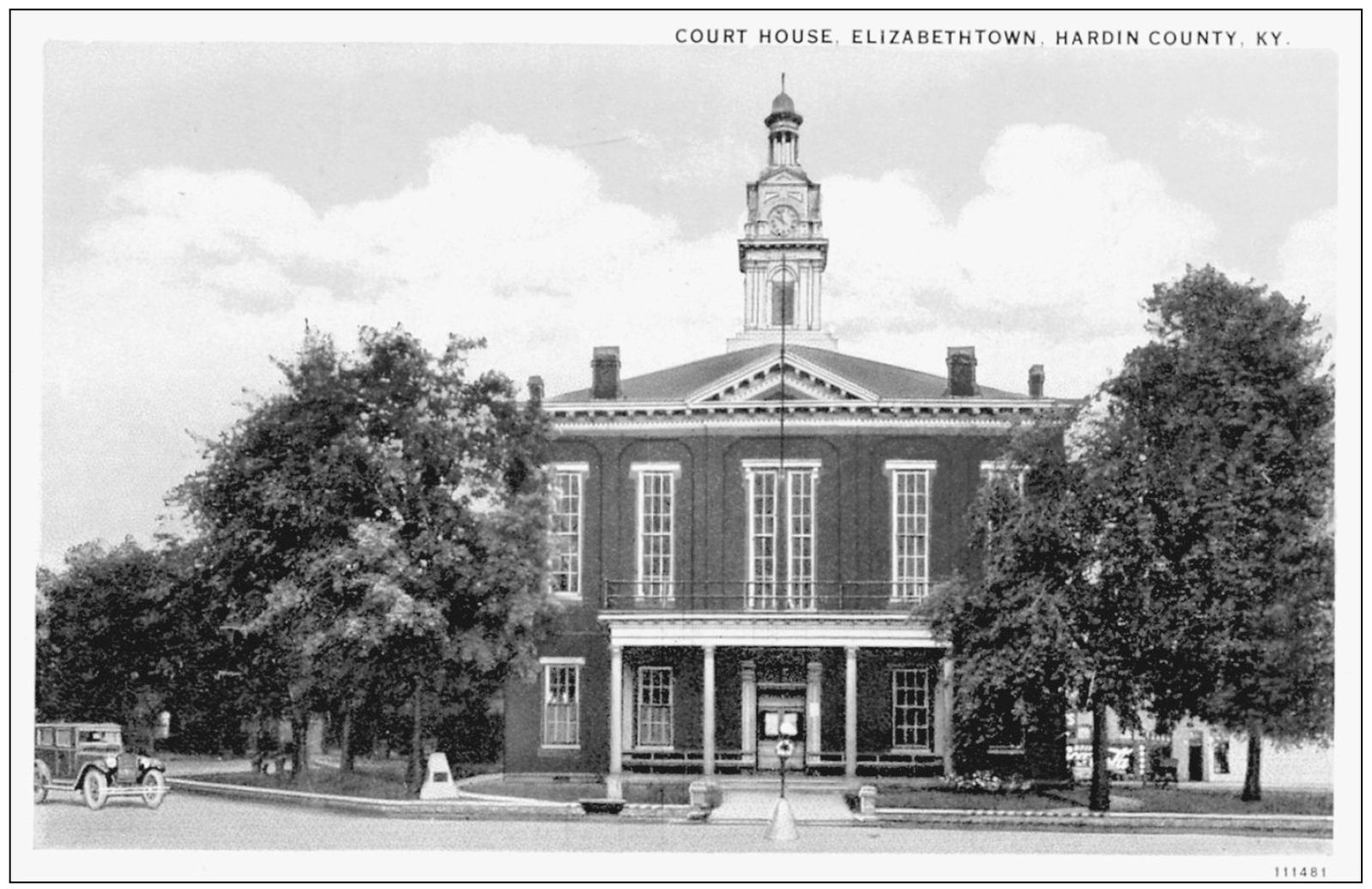 The courthouse is pictured between 1922 and 1932 Notice the obelisk in the - photo 6