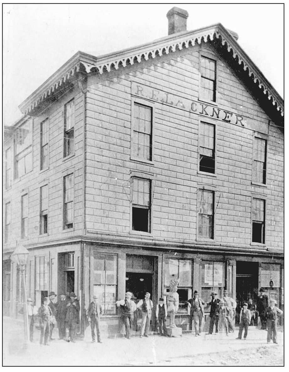 RE Lackner operated a store in this building at the southwest corner of - photo 6