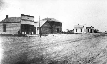 Main Street Springfield Colorado A newspaper office next to the two-story - photo 3