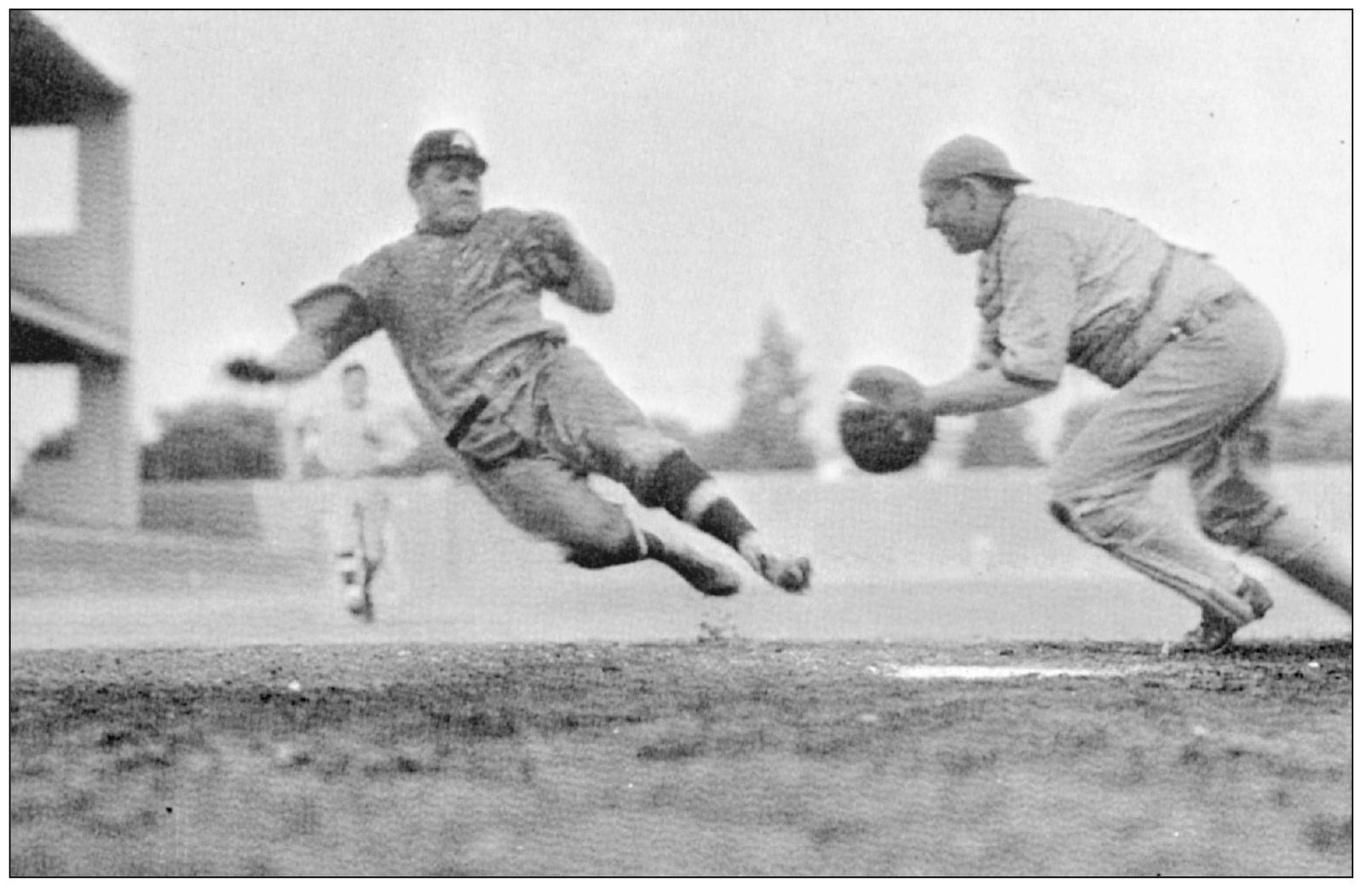 Babe Ruth leaps into home during a 1920s exhibition game at Wrigley Field - photo 6