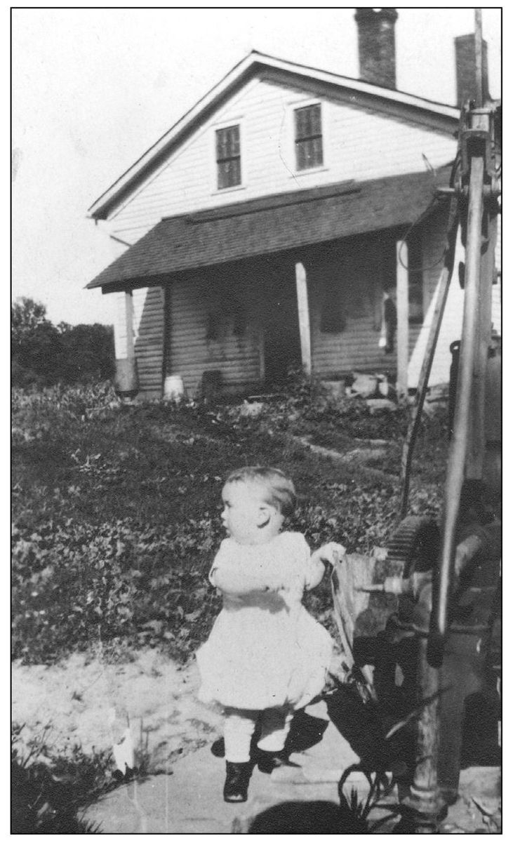 Ralph Kircher Jrs attention is distracted as he holds on to a windmill pump - photo 6