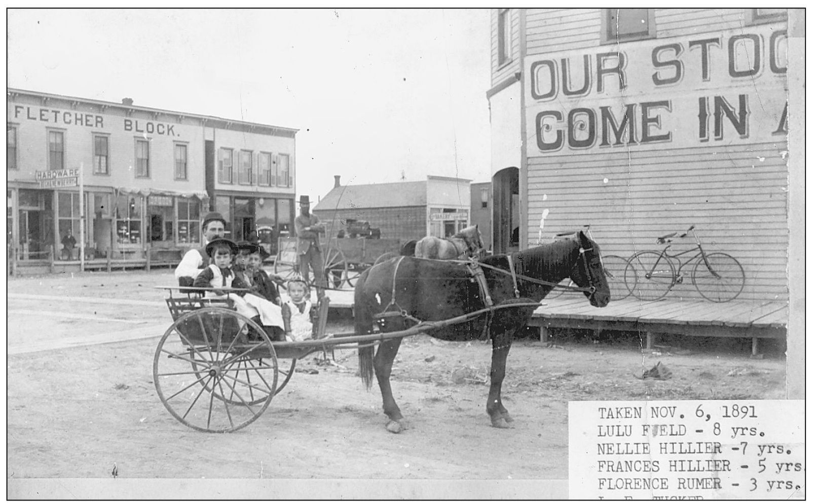 This local group is riding in a horse-drawn buggy on the main street of - photo 10