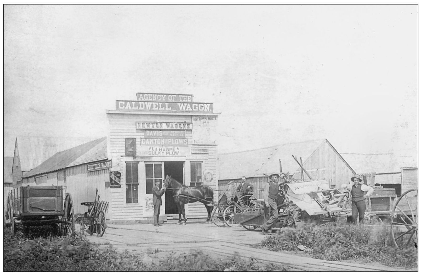 JR Van Boskirk is standing beside his favorite horse Woods at his implement - photo 16