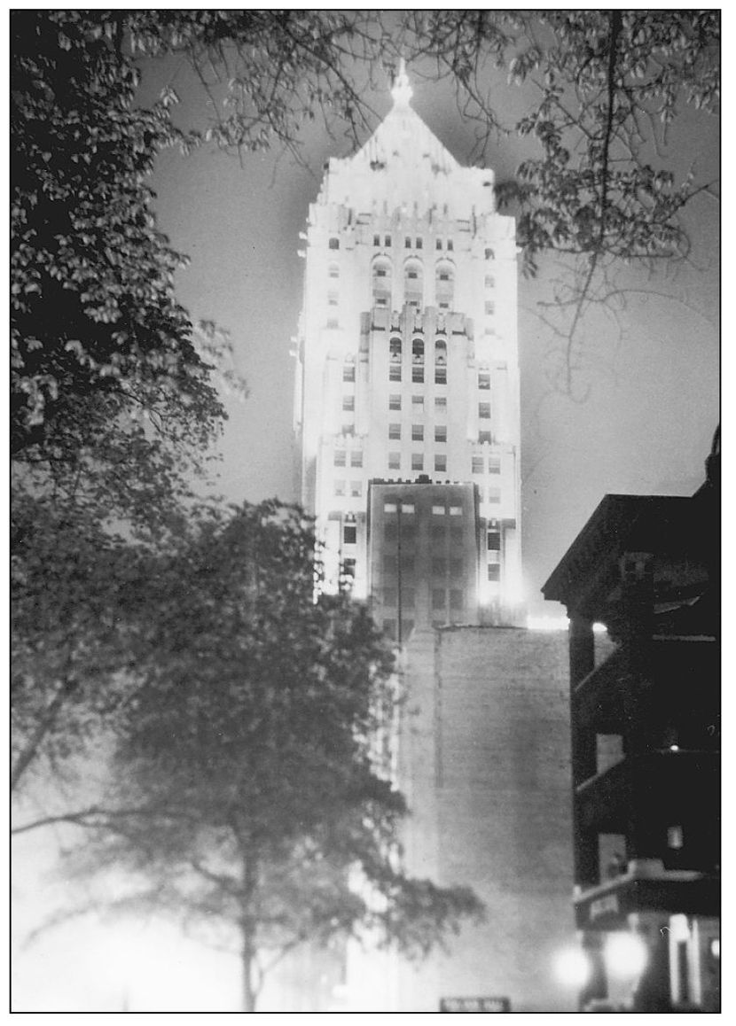 The Golden Tower of the Fisher Building brightens the skyline of Detroit The - photo 7