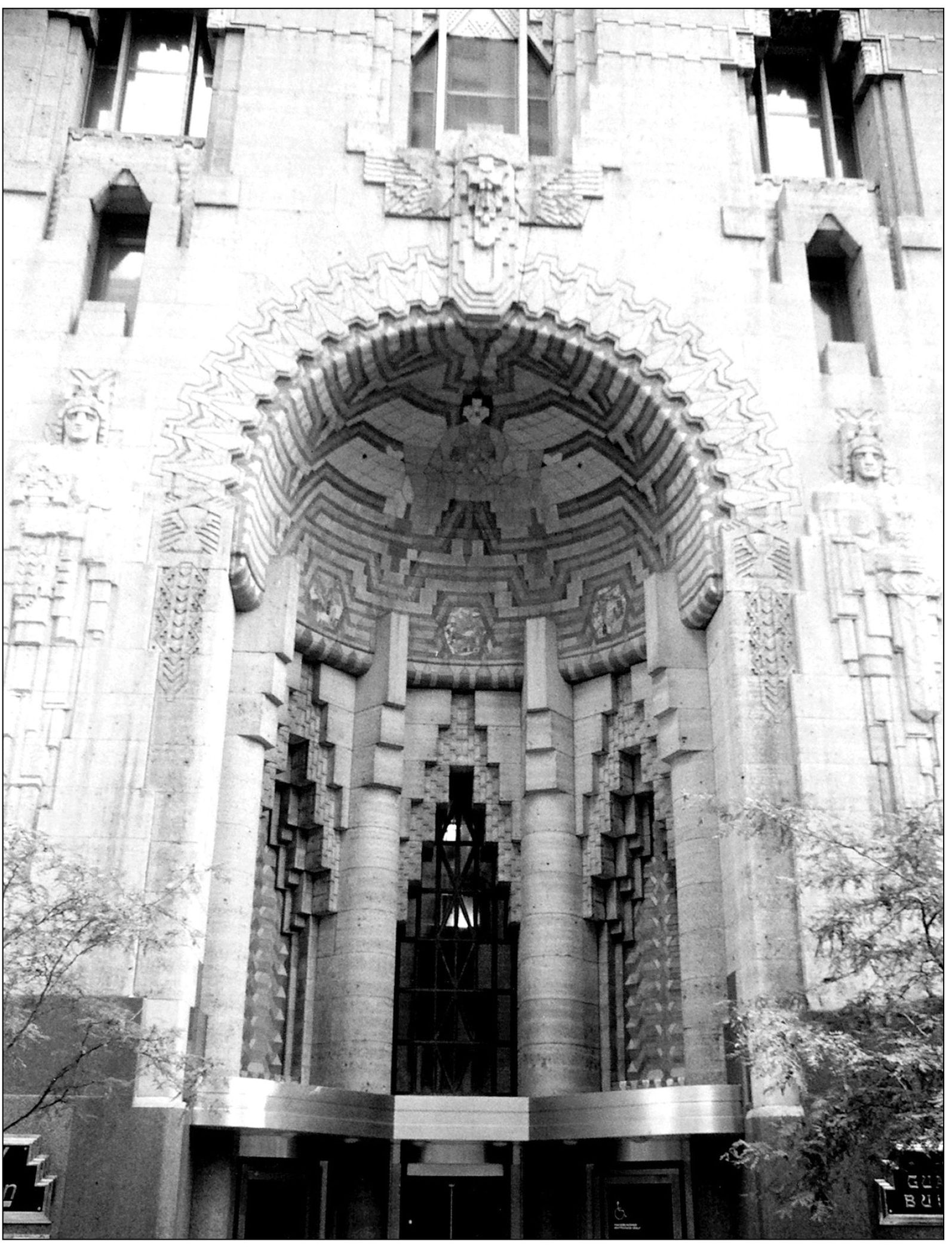 The main entrance to the Guardian Building is flanked by reliefs of Safety and - photo 13