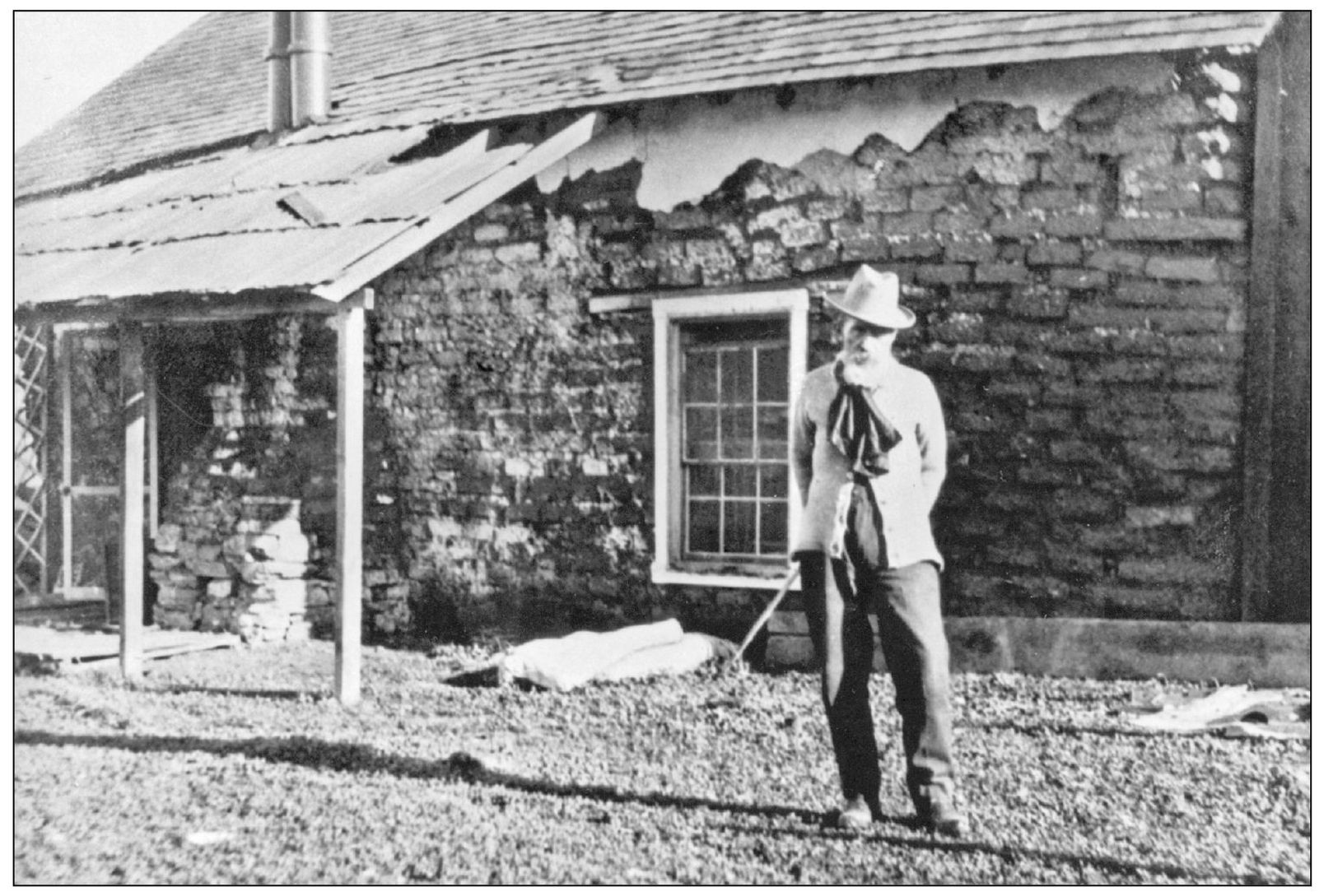 Andrew Russell poses in front of the remnants of the de La Guerra adobe that - photo 6