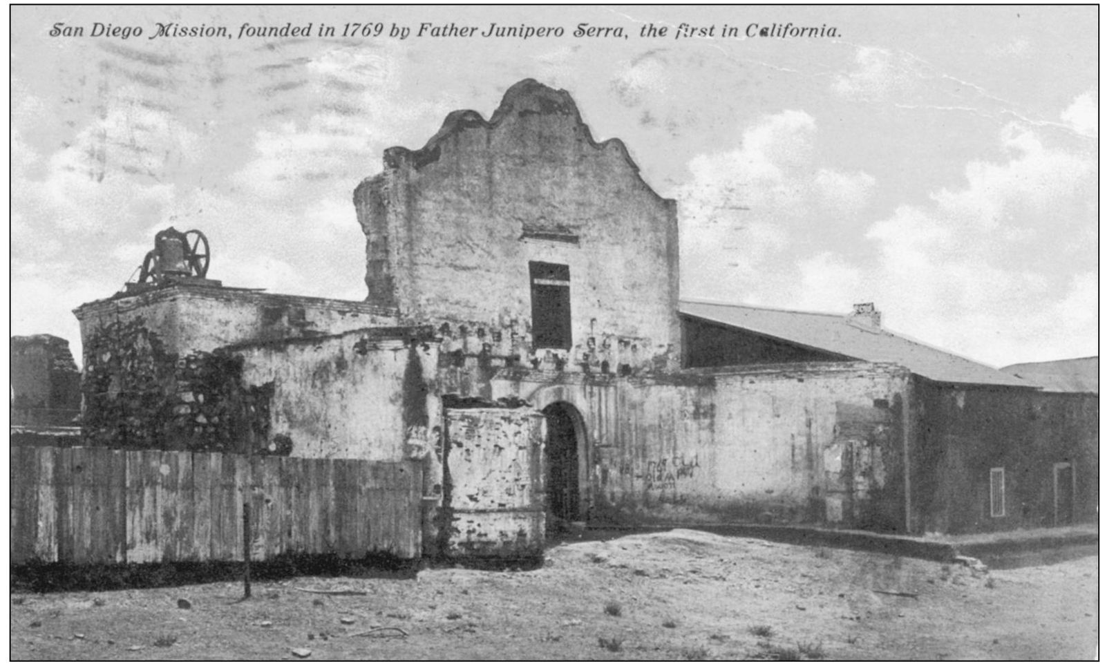 This close-up postcard of the mission San Diego de Alcal includes a postmark on - photo 5