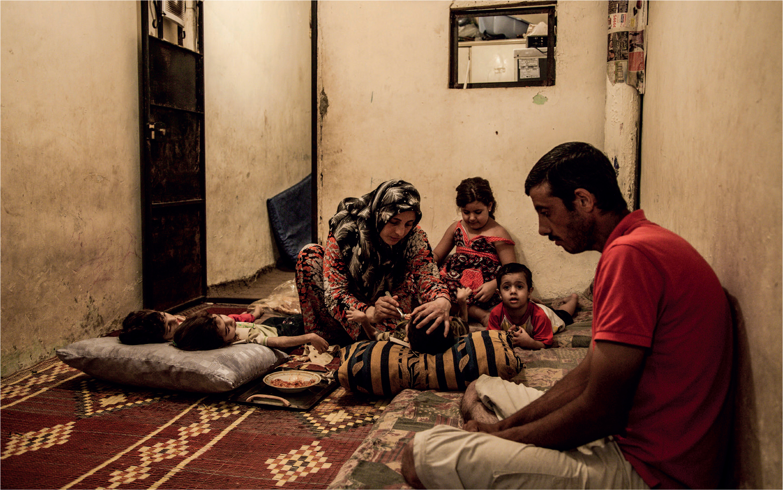 A Syrian family living in urban destitution in an apartment block in Beirut - photo 7