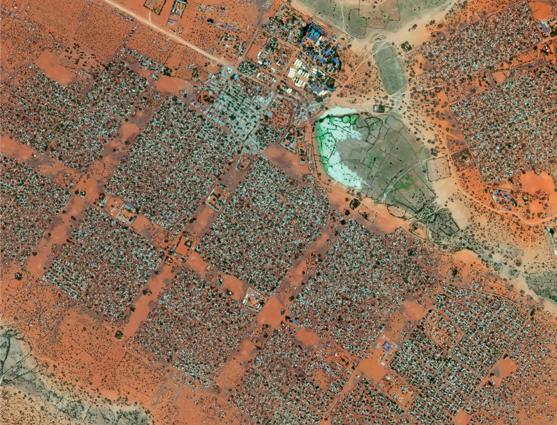 Satellite imagery of the Dadaab refugee camps in Kenya which host nearly - photo 8