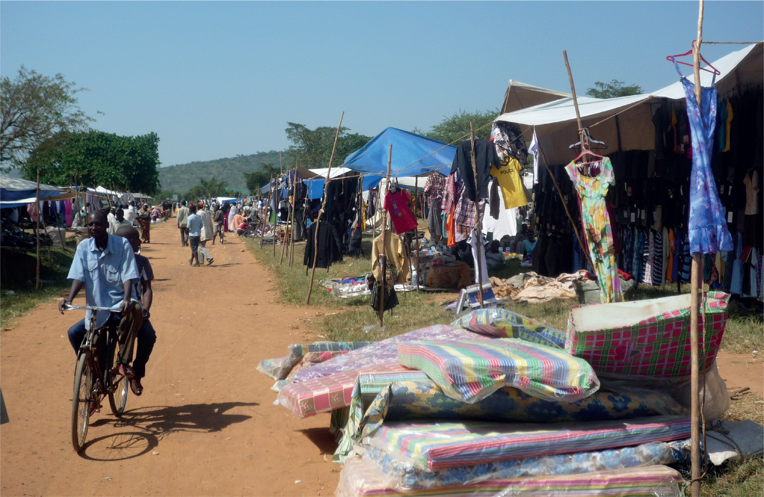 The bustling Juru market in Nakivale settlement in Uganda created in 1958 and - photo 10