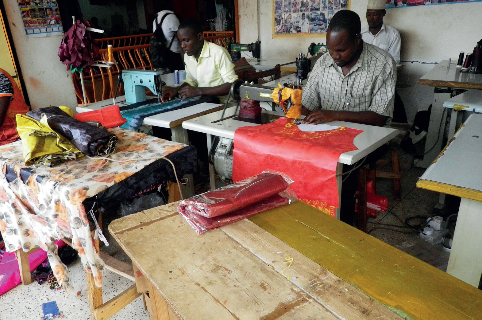 Refugee and local tailors working alongside one another in Kampala Uganda is - photo 15