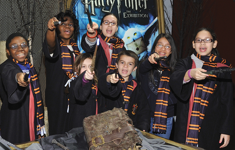 Excited New York City children celebrate Harry Potter The Exhibition making - photo 4