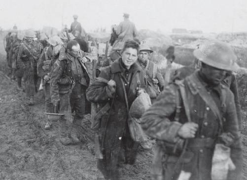 Canadian soldiers march off the battlefield They leave behind the strain of - photo 3