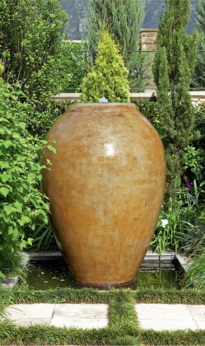 One of a pair of bespoke urns in light ochre that have been placed in matching - photo 10