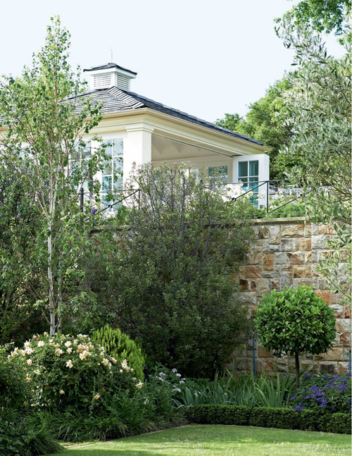 The 35-metre-high concrete retaining wall clad in sandstone with the - photo 11