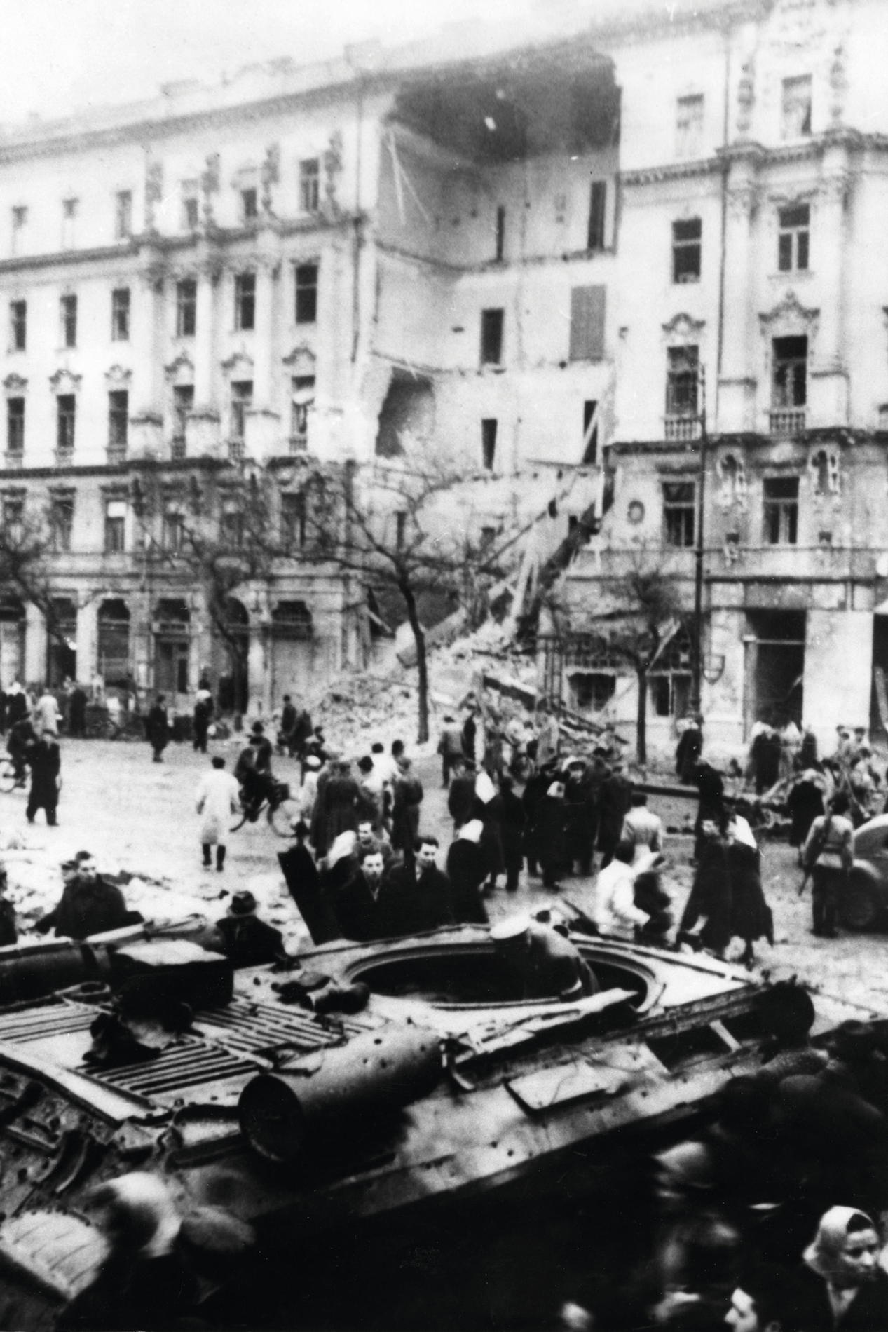 A Soviet tank and a building in Budapest destroyed by heavy fighting during - photo 8