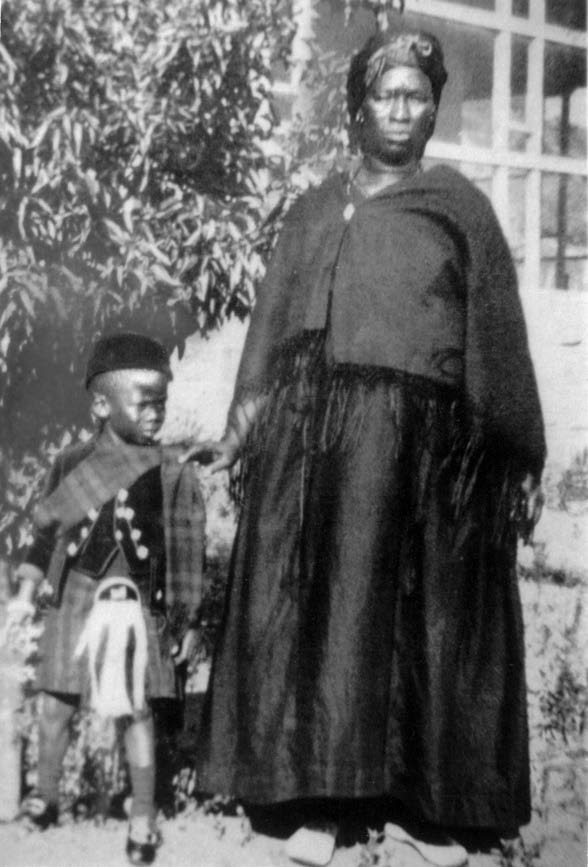 Seretse Khama aged four in Scottish Highland dress at the installation of - photo 2