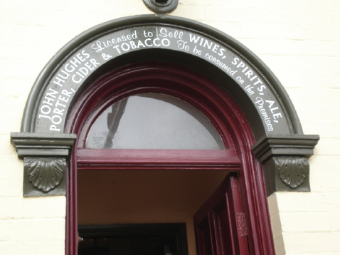 Sign above the door of the Beacon Hotel brewery tap of Sarah Hughes Brewery in - photo 2