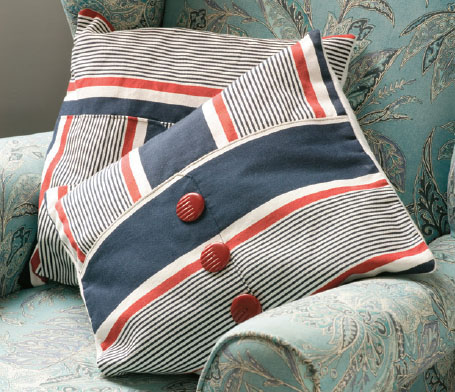 Decorative buttons draw attention to the clever use of striped fabric in these - photo 7