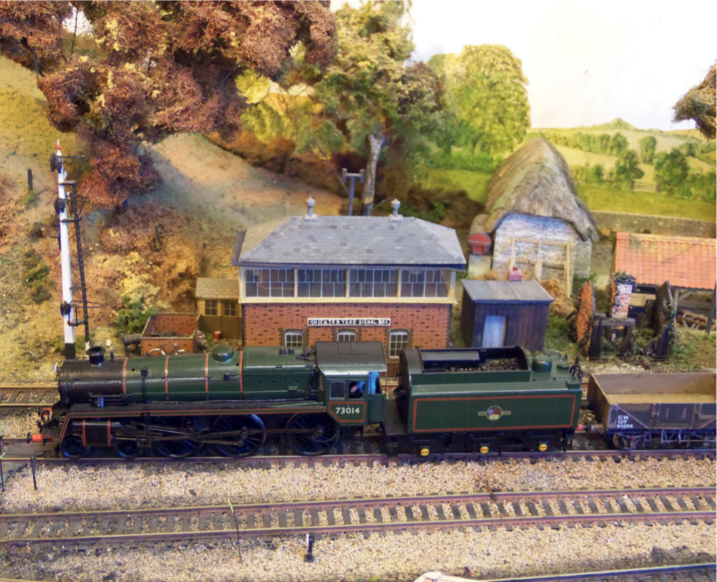 A Standard 4-6-0 on the up oil passing Knighton Yard box It is surprising - photo 5